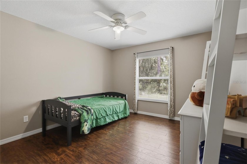 Virtually Staged. Welcome to this beautifully maintained - photo 34