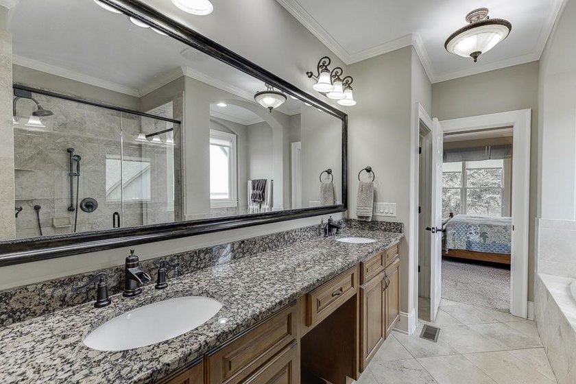 Nestled on a private one-acre homesite within the sought-after - photo 35