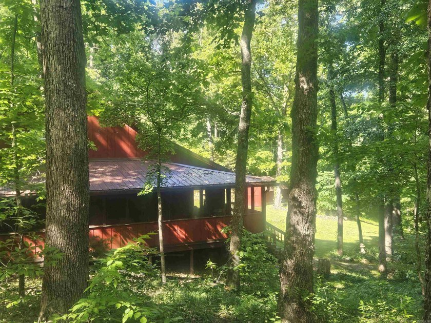 Hidden from the main road &amp; tucked deep in the Ozark woods, but - photo 36
