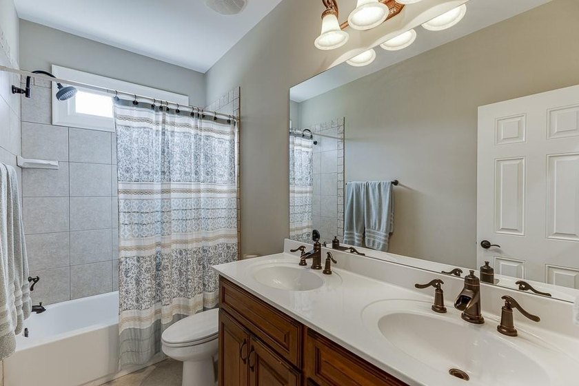 Nestled on a private one-acre homesite within the sought-after - photo 37