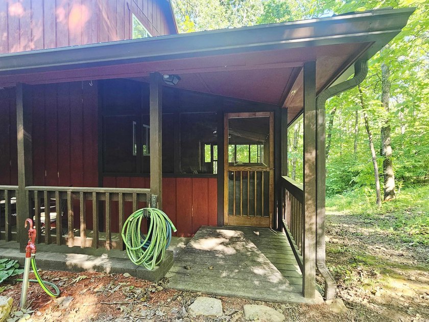 Hidden from the main road &amp; tucked deep in the Ozark woods, but - photo 38