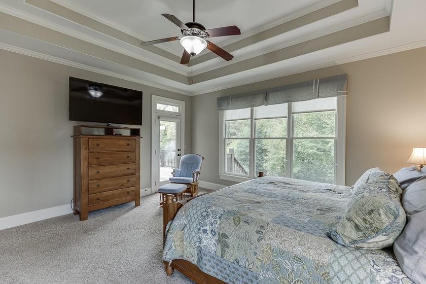 Nestled on a private one-acre homesite within the sought-after - photo 39