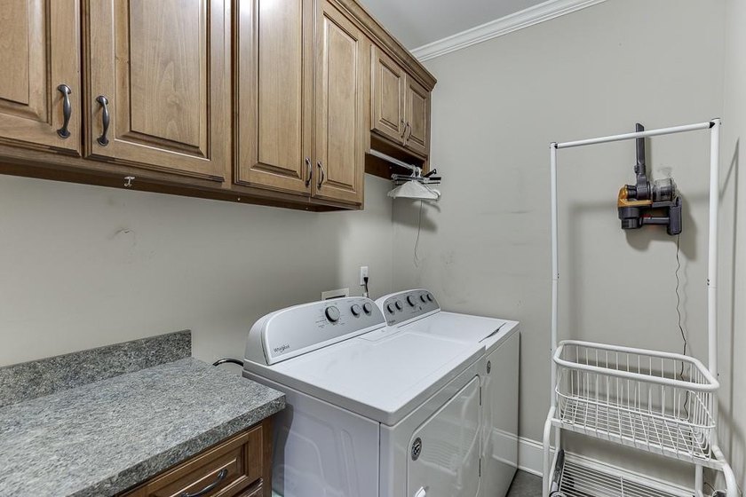 Nestled on a private one-acre homesite within the sought-after - photo 40