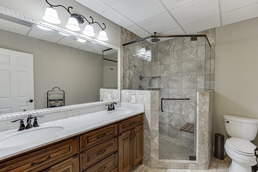 Nestled on a private one-acre homesite within the sought-after - photo 43