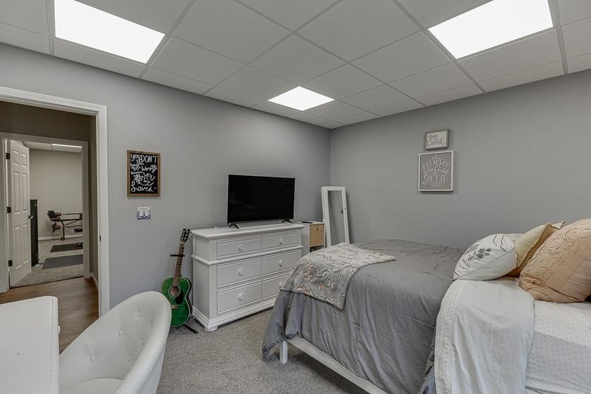 Nestled on a private one-acre homesite within the sought-after - photo 45