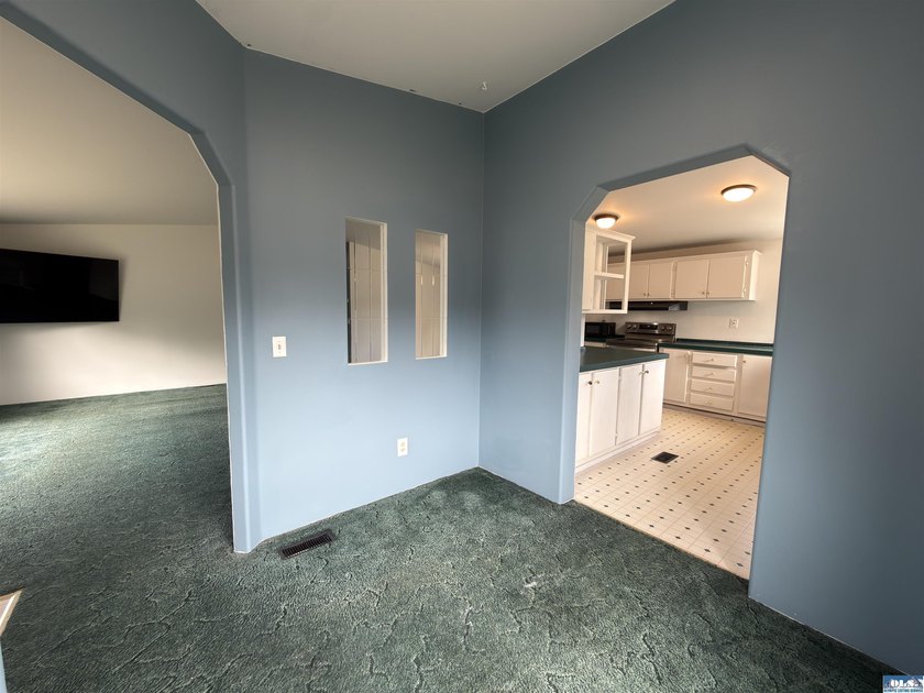 Fresh, comfortable, and move-in ready, this 3 bed, 2 bath home - photo 4