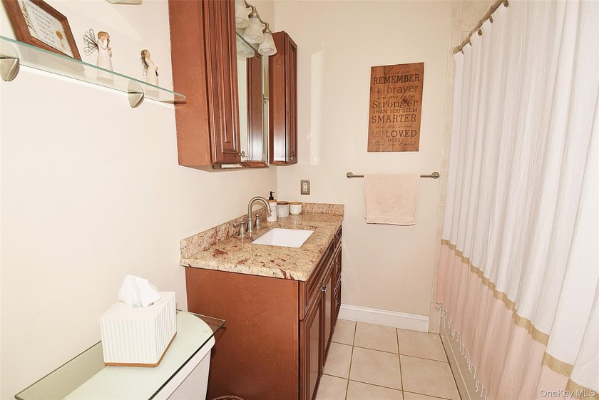 This well-cared for beauty on a quiet block may be just what you - photo 11