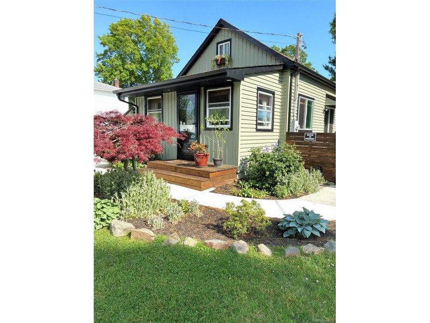 This well-cared for beauty on a quiet block may be just what you - photo 21