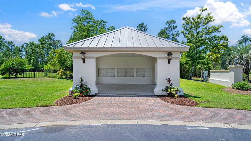 Nestled within the gated coastal community of Laird Bayou, this - photo 22