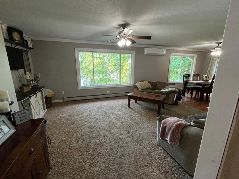This spacious 5-bed, 3-bath walk-out home on Rainy River offers - photo 14