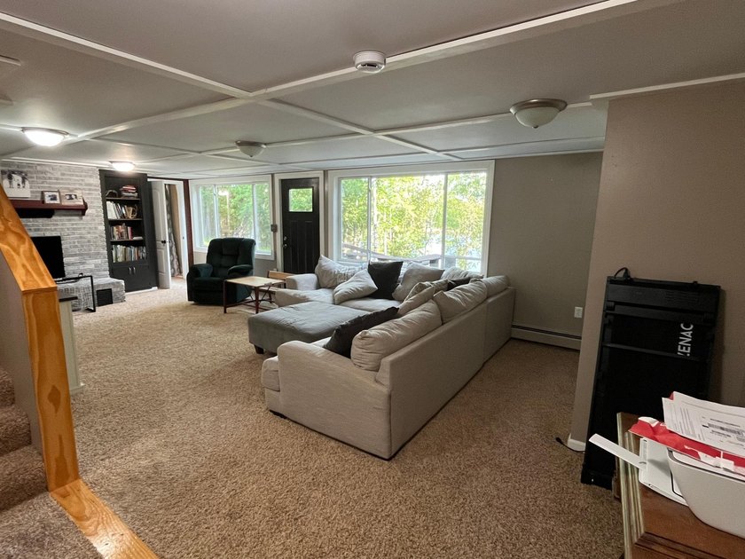 This spacious 5-bed, 3-bath walk-out home on Rainy River offers - photo 24