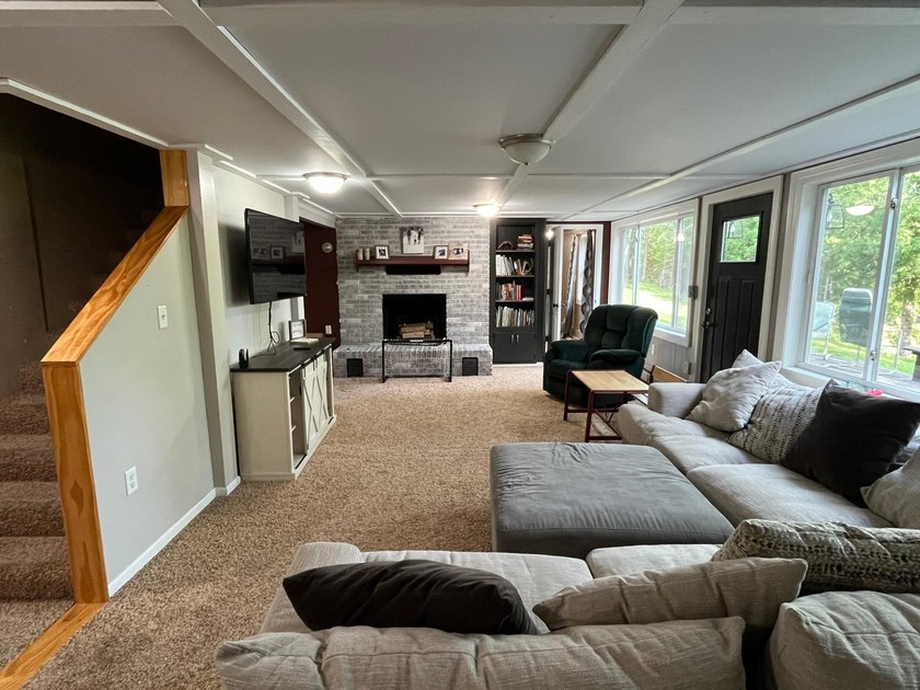 This spacious 5-bed, 3-bath walk-out home on Rainy River offers - photo 25