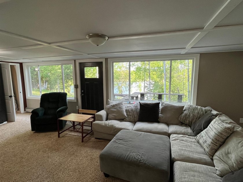 This spacious 5-bed, 3-bath walk-out home on Rainy River offers - photo 26