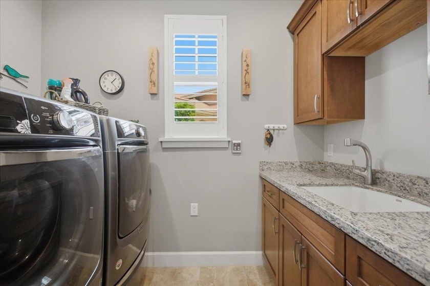 2451 Umeke Cir has the ideal 1 1/2-story floor plan that offers - photo 32