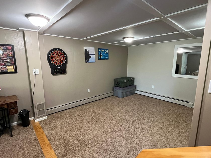This spacious 5-bed, 3-bath walk-out home on Rainy River offers - photo 34