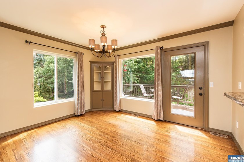 This beautifully appointed home offers water views, thoughtful - photo 6