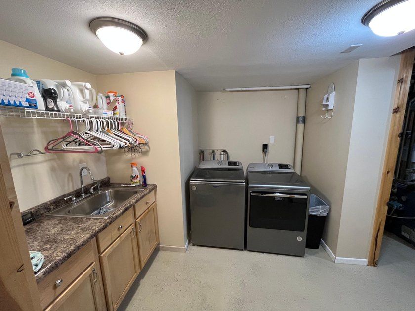 This spacious 5-bed, 3-bath walk-out home on Rainy River offers - photo 38