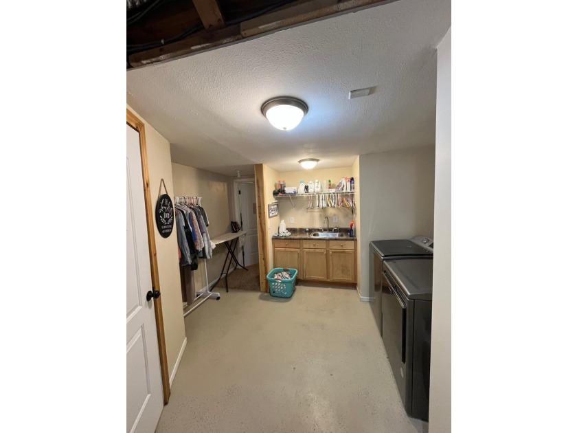 This spacious 5-bed, 3-bath walk-out home on Rainy River offers - photo 39