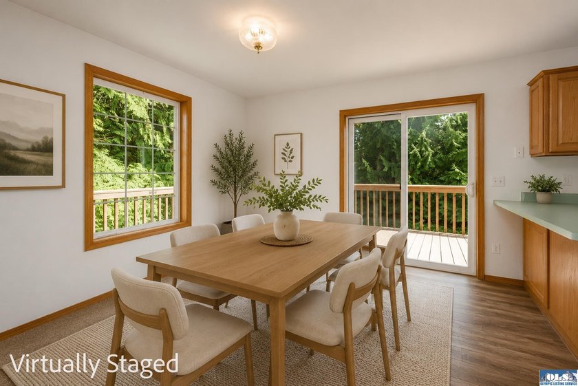Amongst the trees on an acre this lovely 4 bed 2.5 bath home is - photo 5