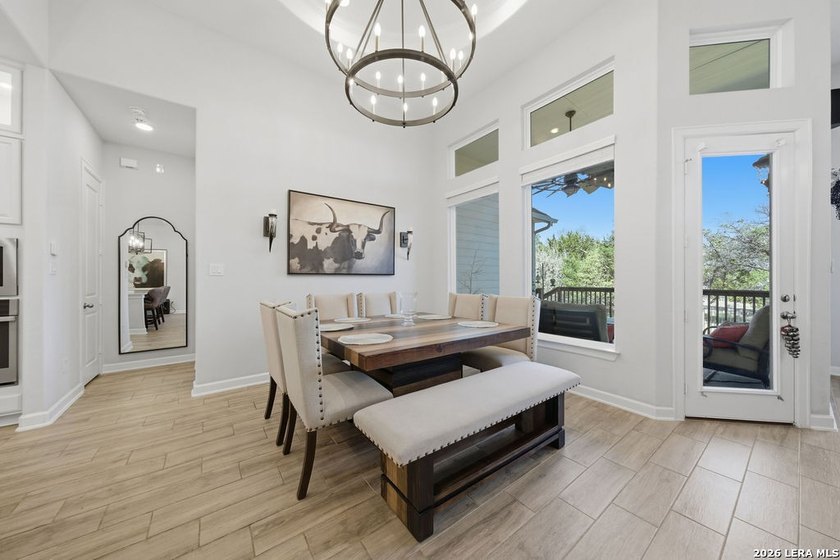 LUXURY UPGRADES! Welcome to this stunning one-story home where - photo 5