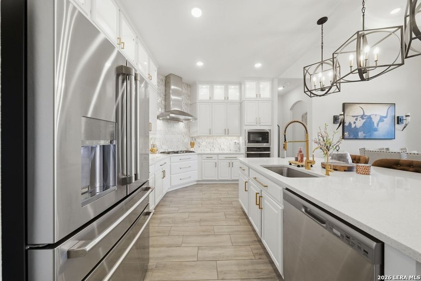 LUXURY UPGRADES! Welcome to this stunning one-story home where - photo 9