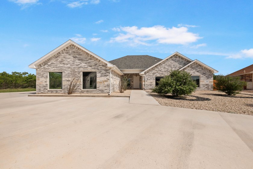 Step into luxury when you tour this exquisite new construction - photo 2