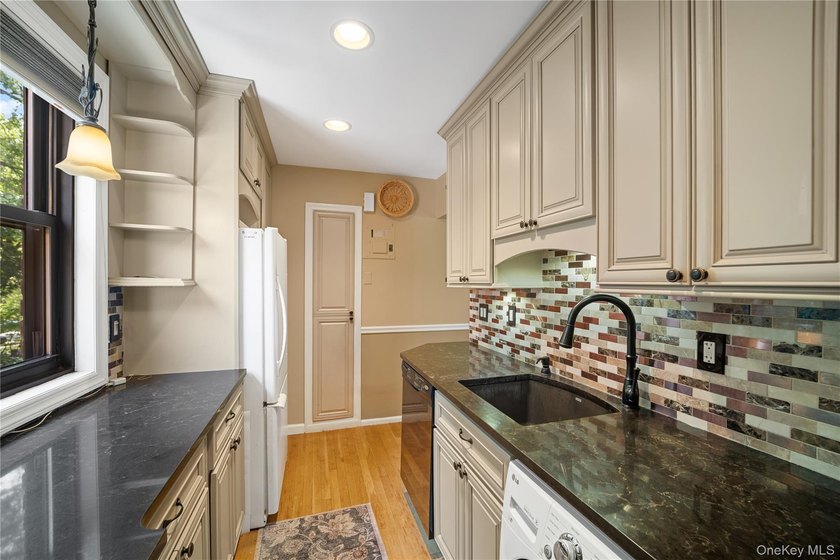This desirable upper-level 2-bedroom cooperative in the - photo 4