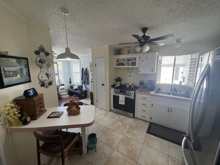 Check out this fully updated 2 BED 2 BATH double wide home on a - photo 3