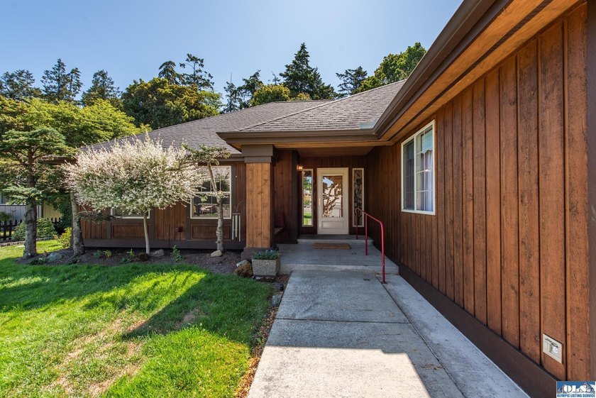 Nestled on a peaceful street in Sequim, this property backs - photo 6