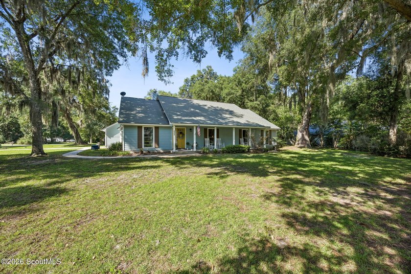 This incredible 4-bedroom, 2-bath home sits on a large corner - photo 2