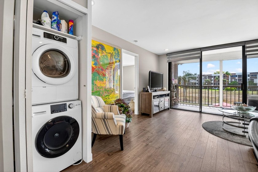This turnkey 55+ condo is nestled within the sought-after - photo 12