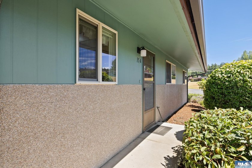 Enjoy easy living in this beautifully situated end-unit condo in - photo 10