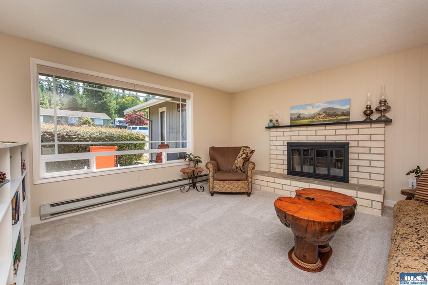 Perched above Sequim, this beautifully updated 3-bedroom, 2-bath - photo 8