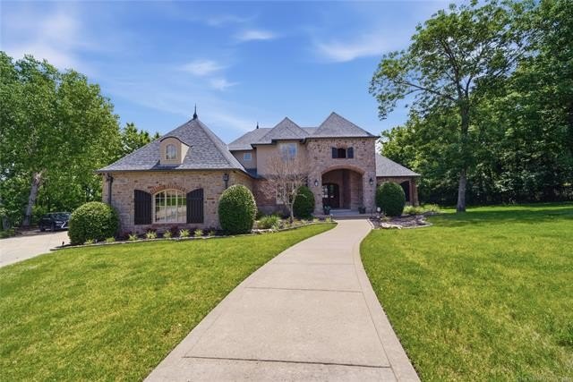 This one-of-a-kind enclave in Jenks is an estate resting on a - photo 4