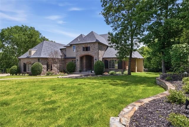 This one-of-a-kind enclave in Jenks is an estate resting on a - photo 5