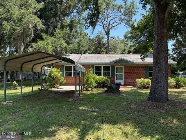 Welcome to this quaint, all-brick home nestled in the heart of - photo 2