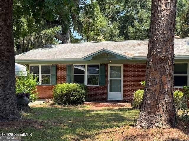 Welcome to this quaint, all-brick home nestled in the heart of - photo 3