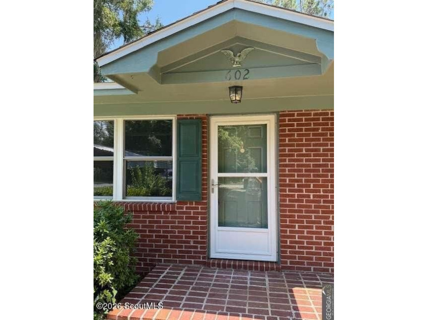 Welcome to this quaint, all-brick home nestled in the heart of - photo 5