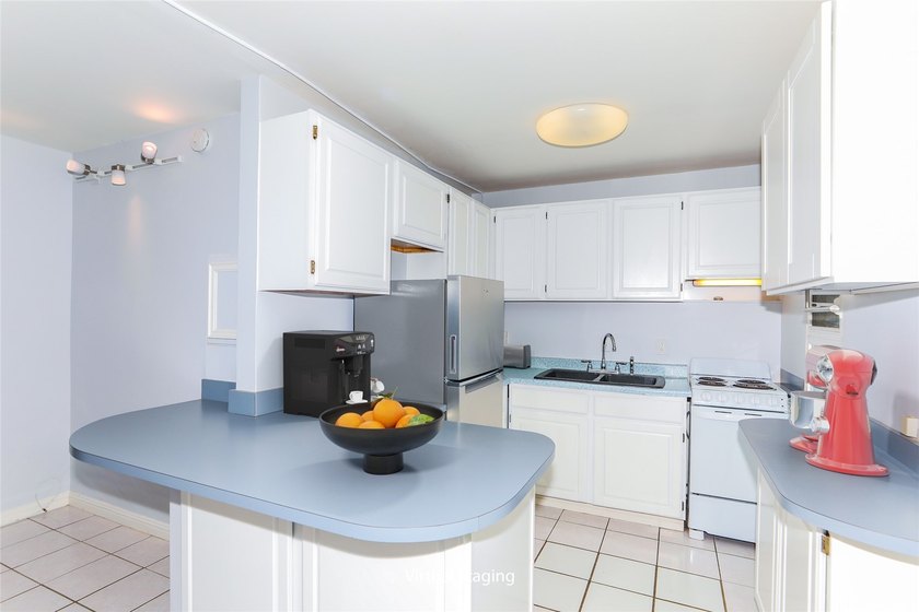Rarely available! This charming 1-bedroom, 1-bath condo is - photo 3