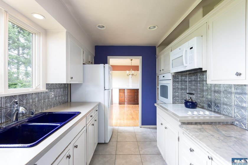 Opportunity awaits on 2.15 acres within the city limits! - photo 9