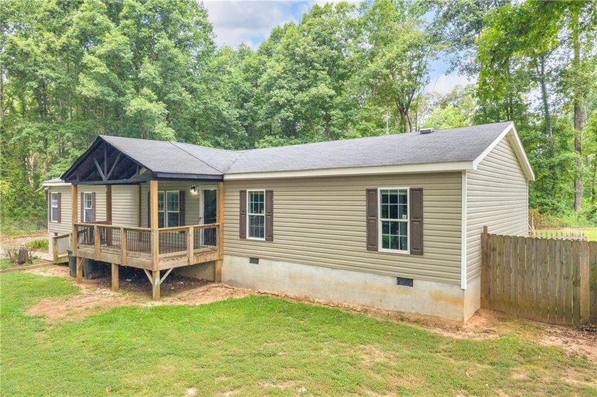 Discover the perfect blend of space, comfort, and country living - photo 3
