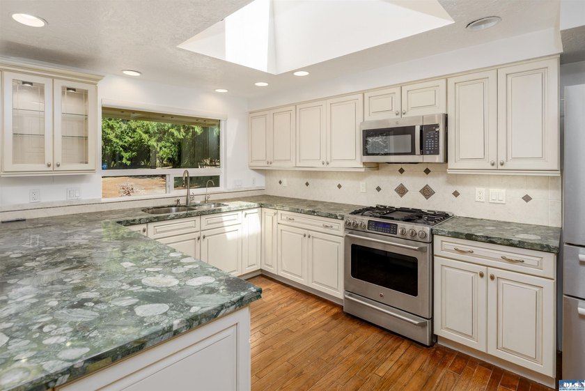 Perched on 2.29 private acres on a flat ridge in the heart of - photo 8