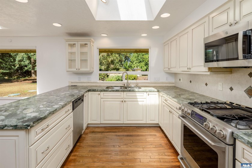 Perched on 2.29 private acres on a flat ridge in the heart of - photo 9