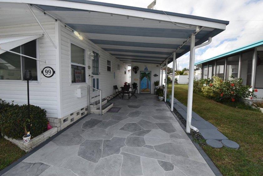 This immaculate home full of upgrades and renovations sits steps - photo 3
