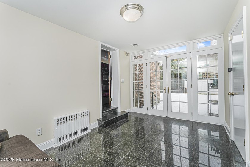 This beautifully updated home, expanded in 2007 to approximately - photo 5