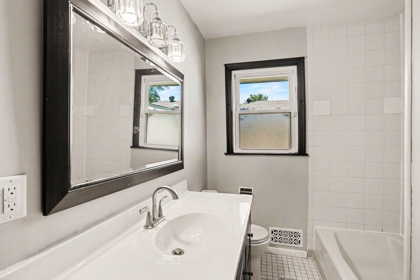 Welcome to this updated Rambler home located just minutes away - photo 11