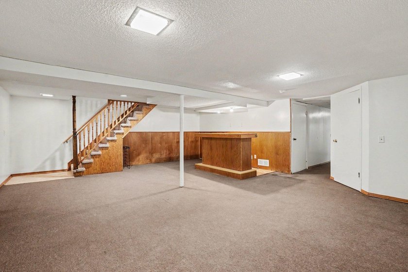 Welcome to this updated Rambler home located just minutes away - photo 16