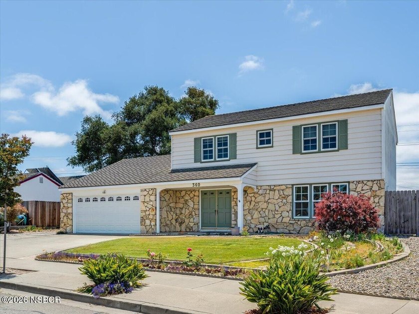 Welcome to this beautiful two-story home located in the highly - photo 3
