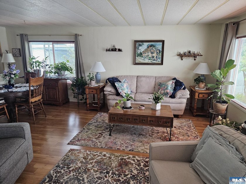 Very well kept home in Juniper Mobile Estates. This home is - photo 7