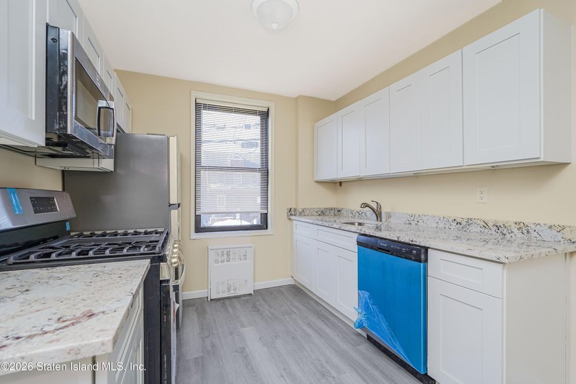 Totally renovated one bedroom condo, located in the Heart of - photo 10